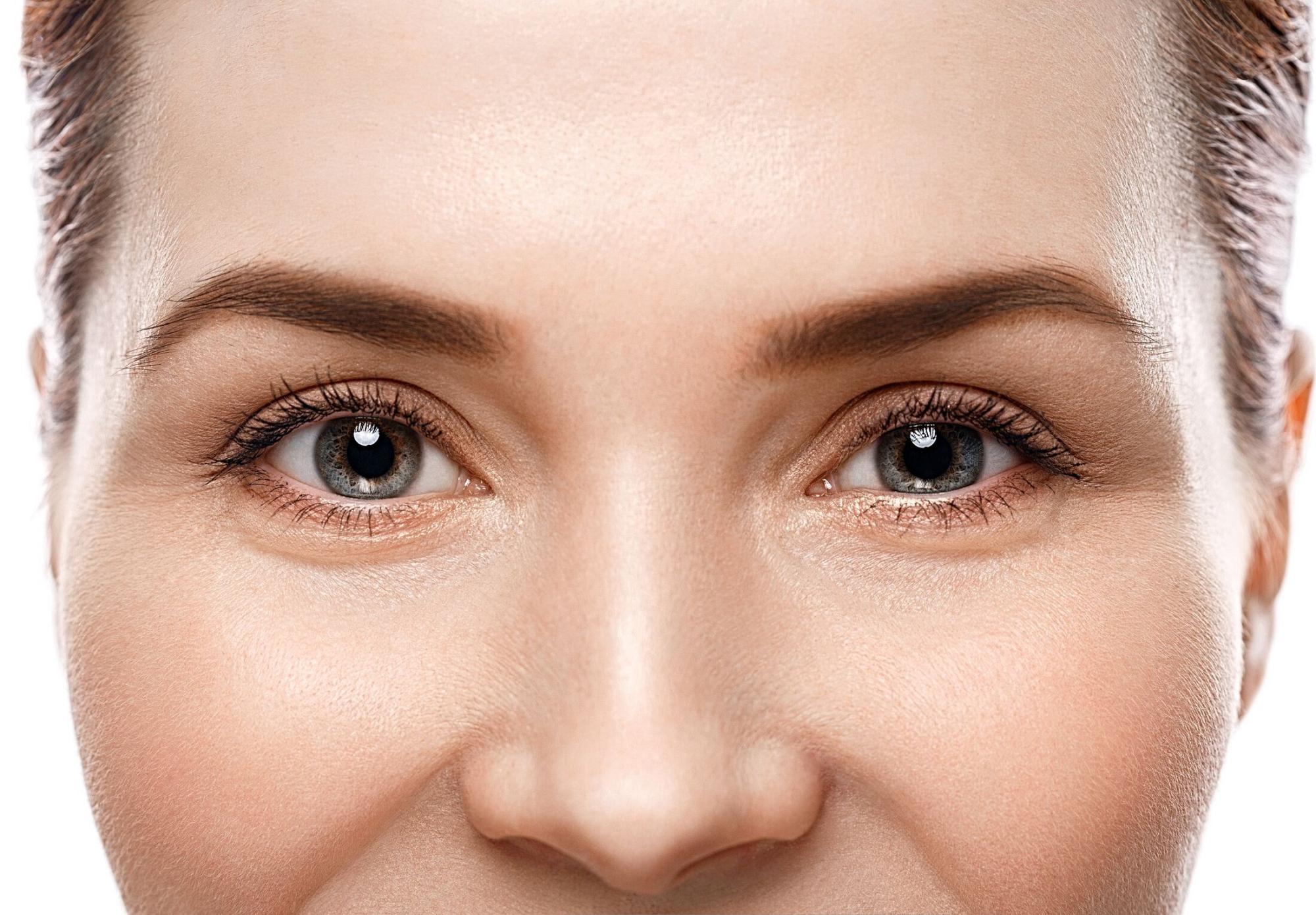 Up close photo of woman’s forehead, eyes, and nose